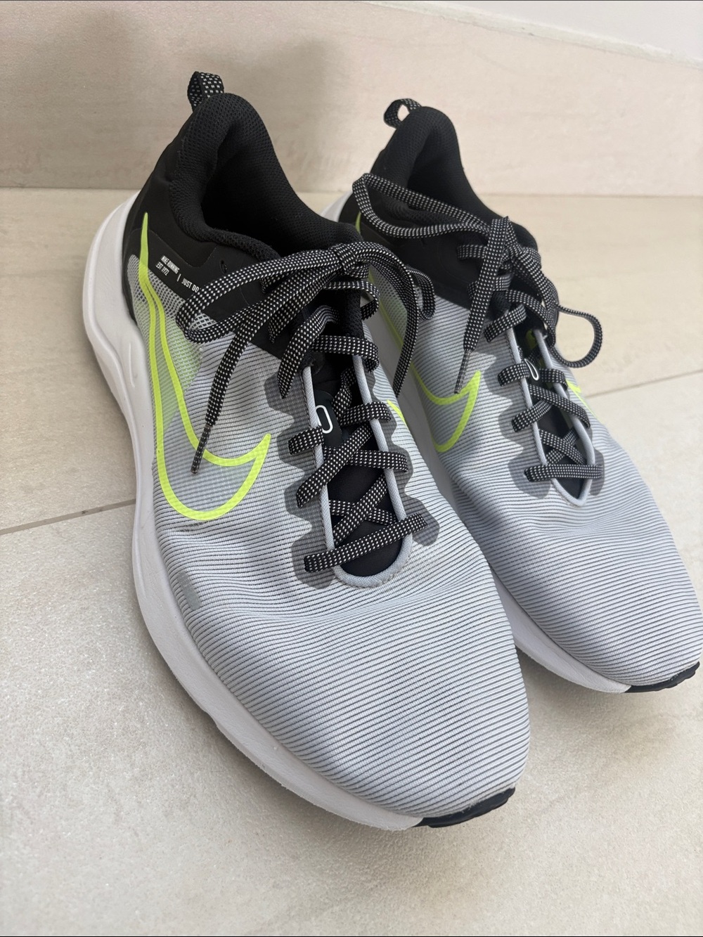 Nike Men’s Gray Athletic Shoes with Neon Yellow Swoosh